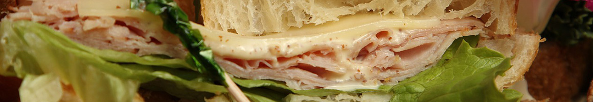 Eating Sandwich at La Vita Dolce restaurant in Chapel Hill, NC.